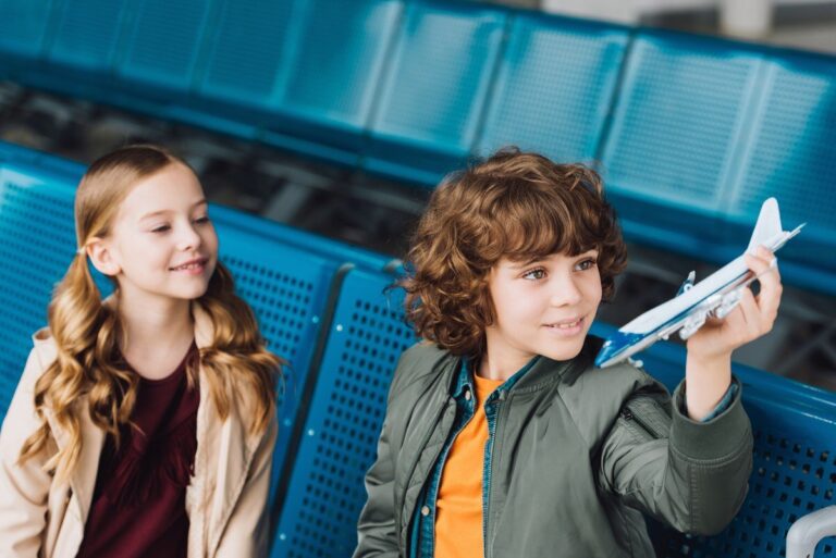 children having fun in an airport